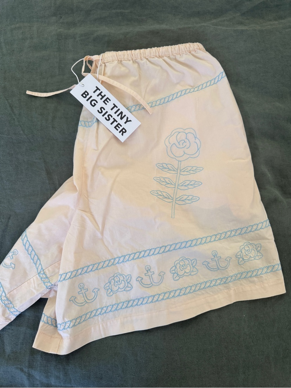 The Tiny Big Sister by tiny cottons Cream Shorts with Blue Embroidery